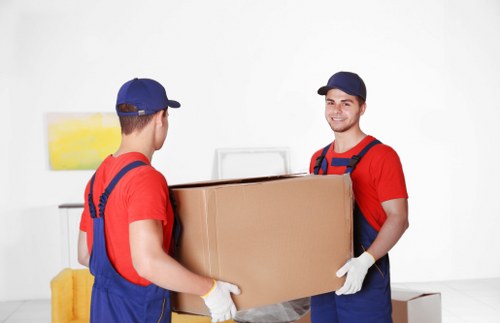 Local removals team handling furniture in Kenley