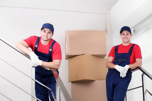 Customer and staff observing safe access in a storage facility