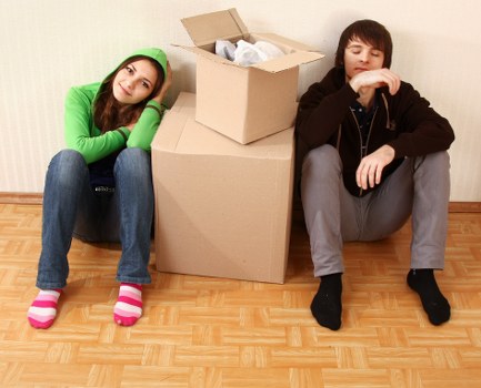 Carefully labelled moving boxes for an apartment relocation in Kenley