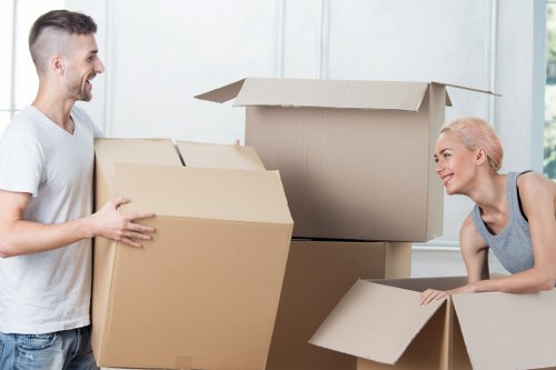 Professional movers handling furniture during Kenley house removals